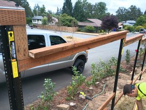How to put a top rail on lifetime metal fence posts in Portland, OR. Good Neighbor Fence Company