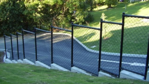 Chainlink fencing on up or down a grade. Portland, OR fence company